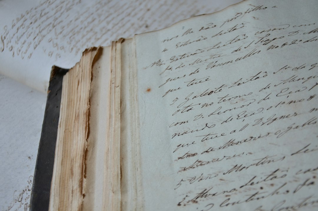 an old book with writing on it
